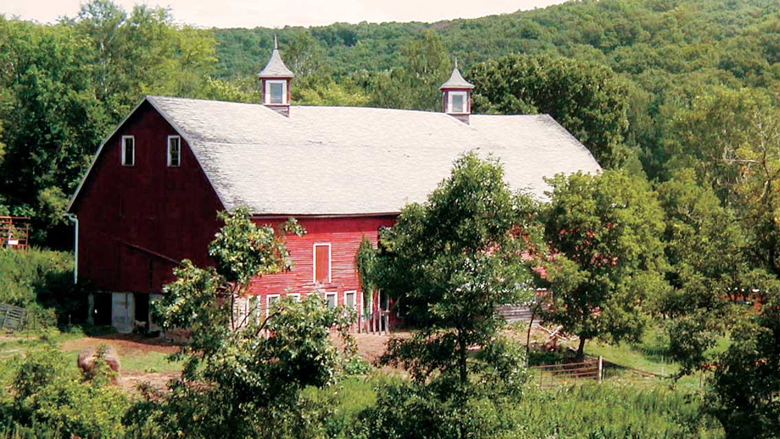 a red barn in the middle of Wisconsin