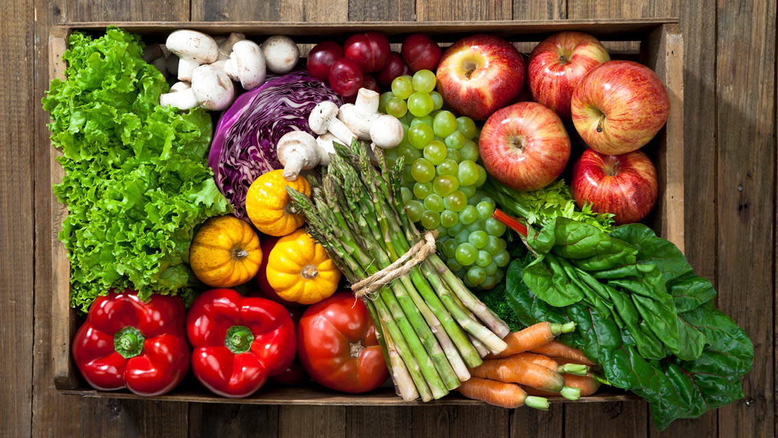 a crate filled with a bounty of fresh produce