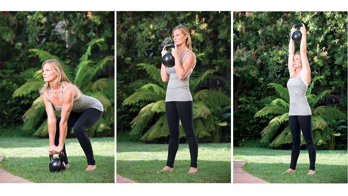 a woman performs a clean and press with a kettlebell