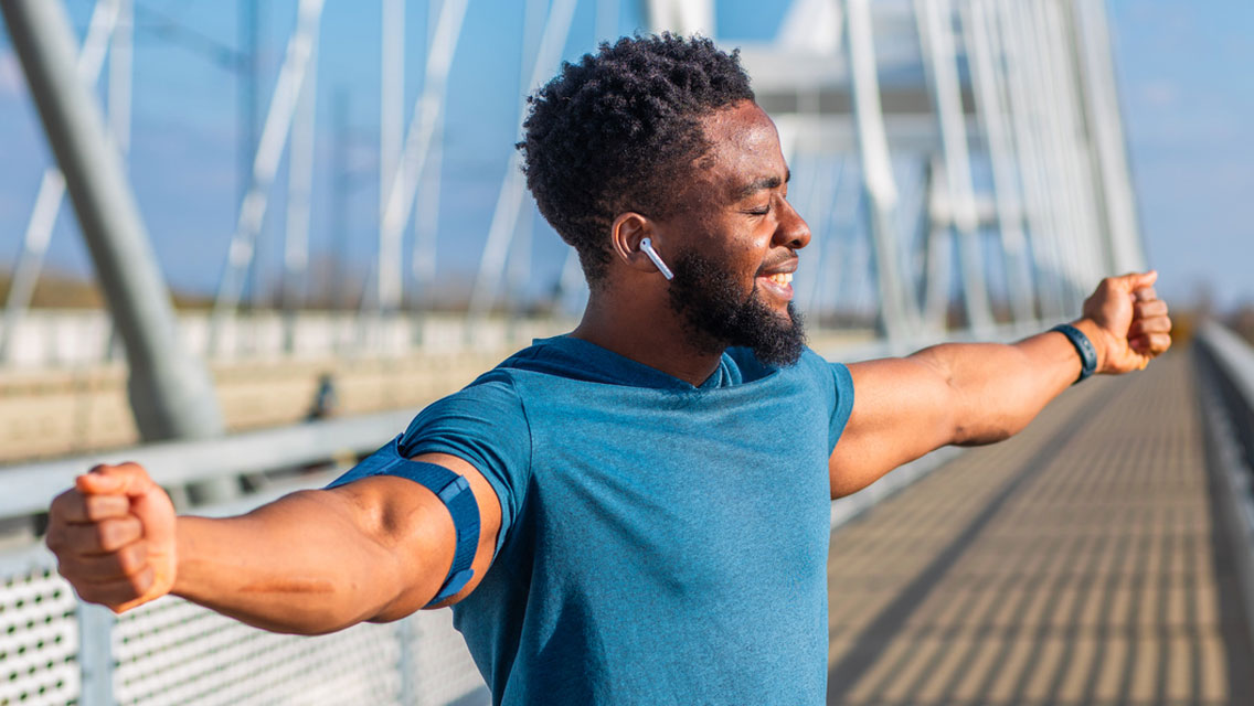 Young fit athlete dancing during outdoor workout