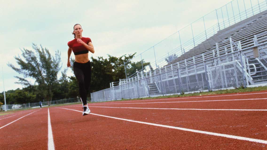 person running on a track