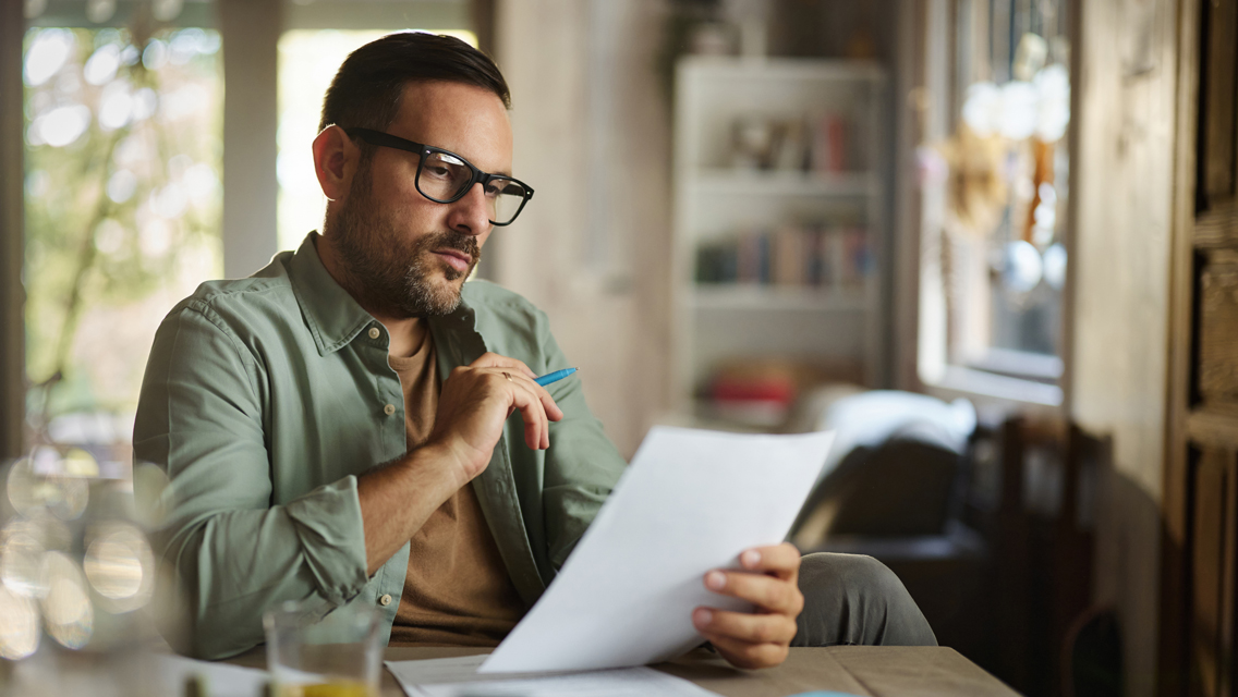 a man looks at his enneagram results