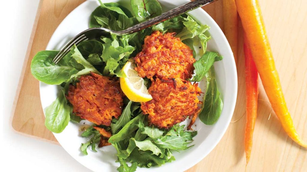 a plate of carrot fritters