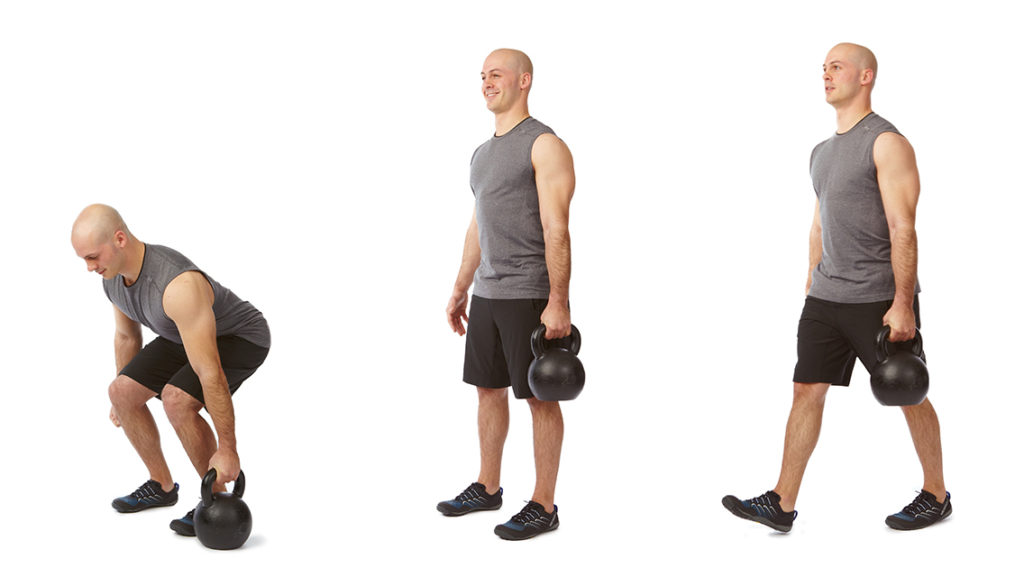 a man performs a unilateral kettlebell carry