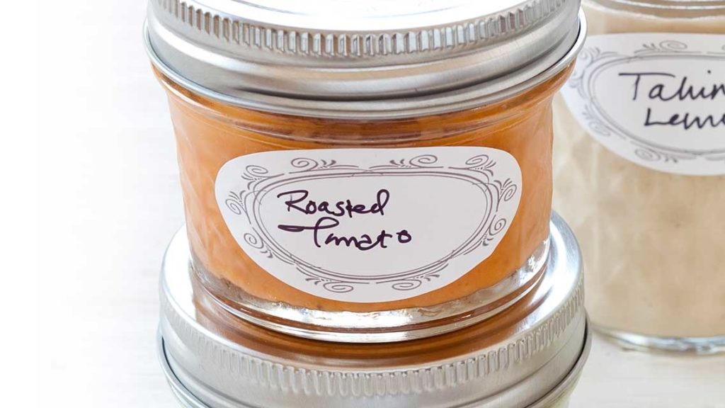 a jar of homemade roasted tomato salad dressing
