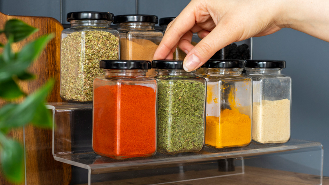 a spice rack of spices known to help prevent cancer