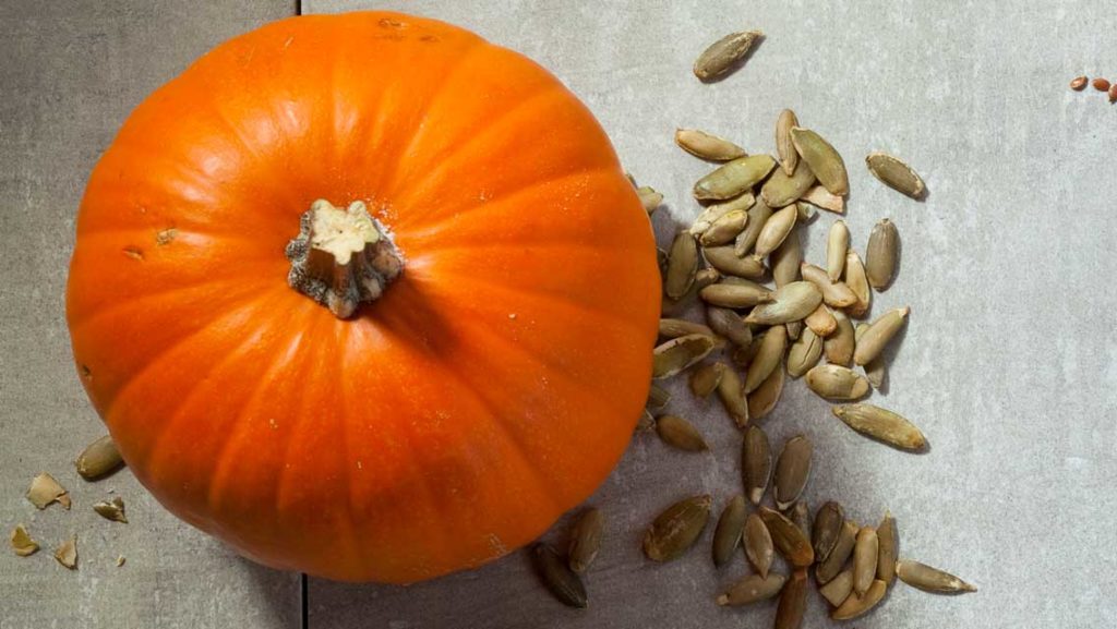 a pumpkin and pumpkin seeds