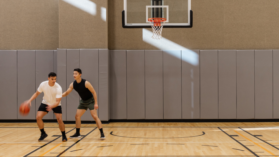 two men playing basketball