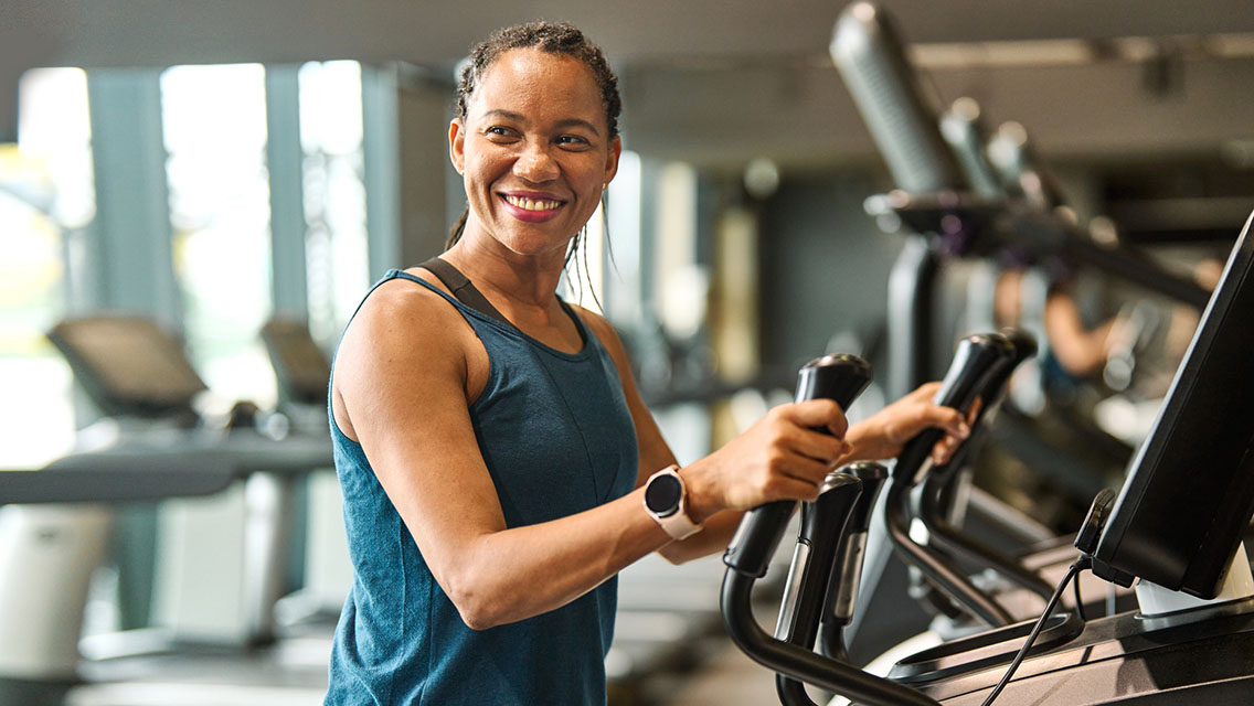 a woman on an elliptical