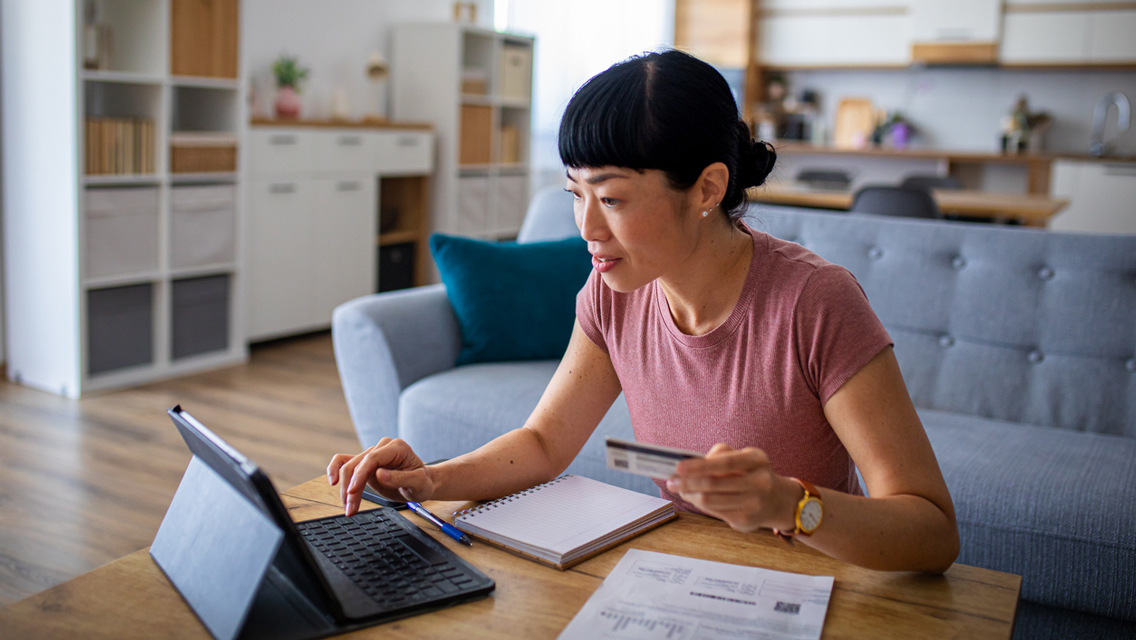 a woman works on her finances