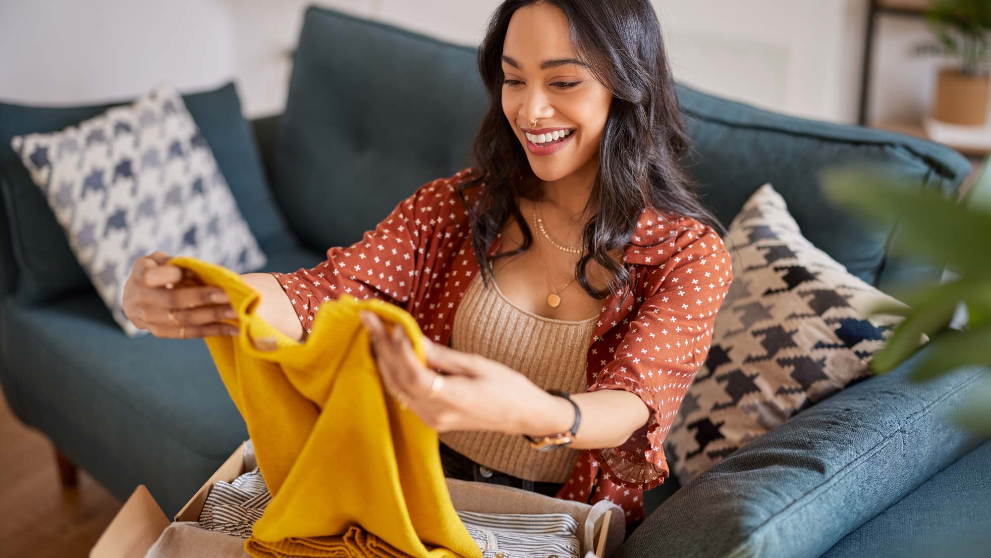 young woman checking her online shopping delivery