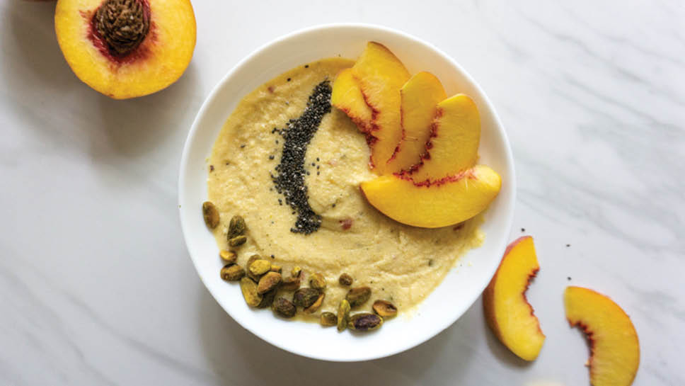 A peaches-and-cream smoothie bowl is pictured.
