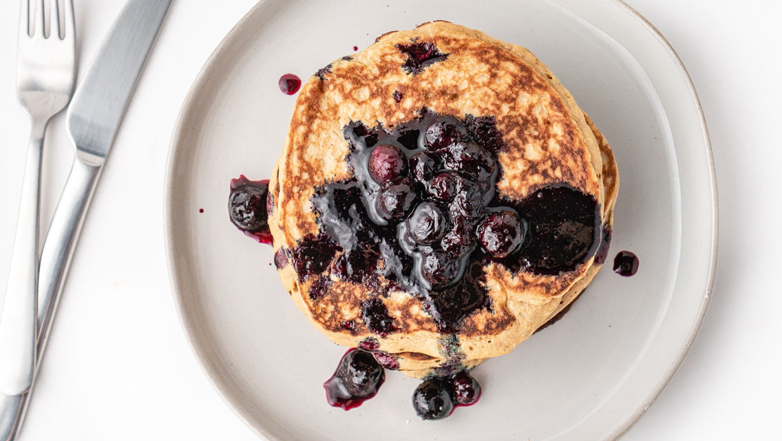 protein pancakes topped with blueberries