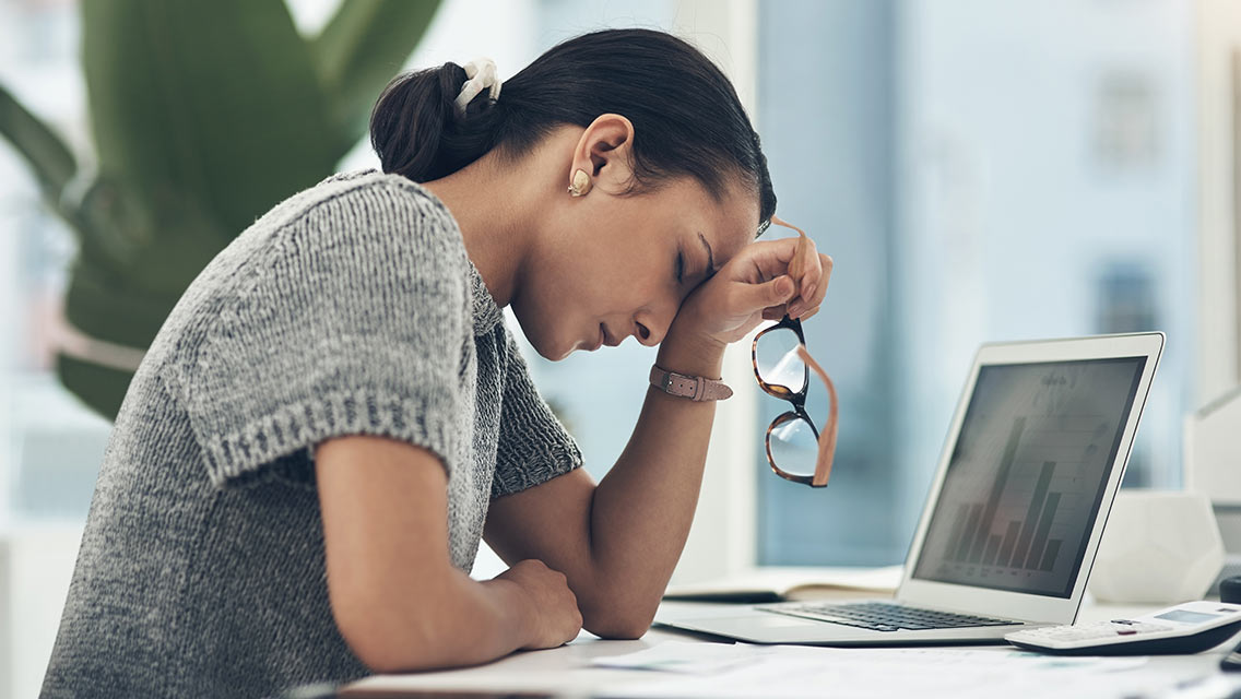 Woman stressed out at desk