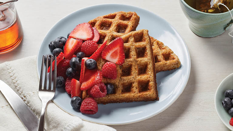 Oat waffles topped with berries