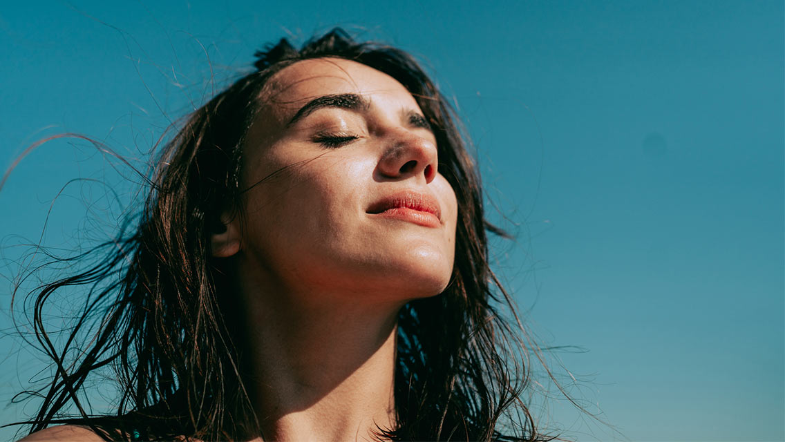 Person standing in sun