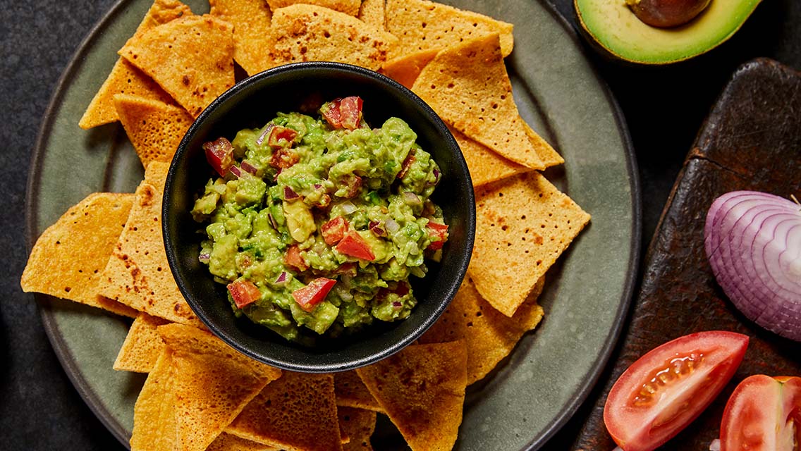 guacamole and socca chips