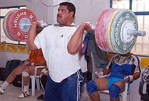 An Iraqi weightlifter with 180 kg (397 lb) in ...