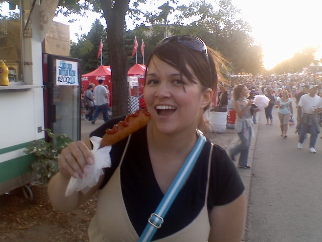 woman eating corndog