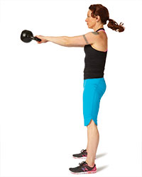 A woman performs a kettlebell-two-hand-swing.