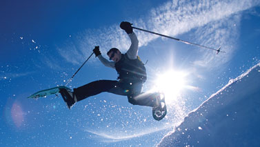 man jumping with snow shoes