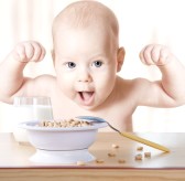 baby flexing while eating cereal