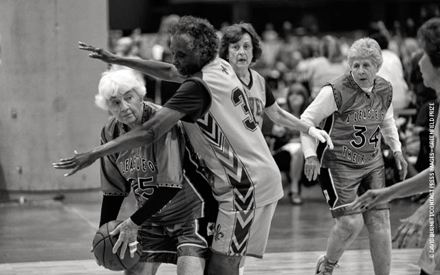 elderly women playing basketball