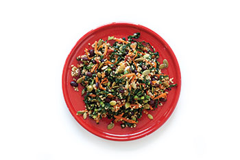 Millet salad on a red plate