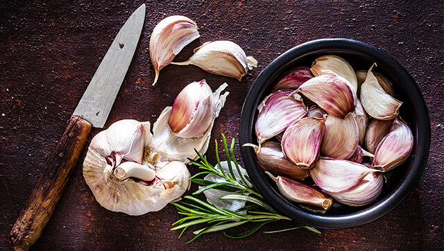 Cloves of garlic on table