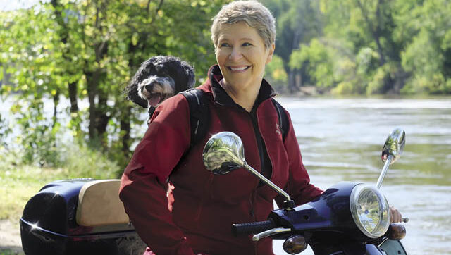 Jane Meronuck with rescue pup (and scooter buddy), Winston