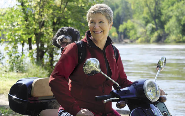 Jane Meronuck with rescue pup (and scooter buddy), Winston