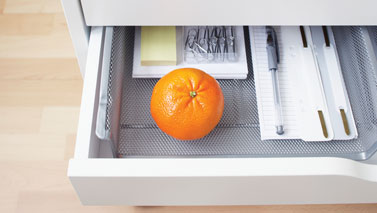 orange in desk drawer