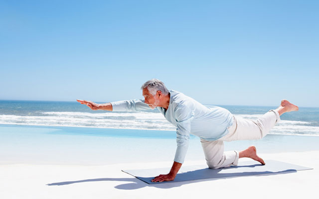 Middle-Aged Man Doing Yoga