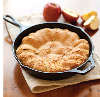 An apple pie made in a cast-iron skillet