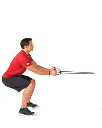 A man performs a resistance-band squat row, second picture.