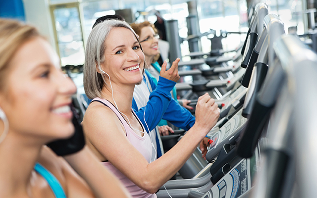 smiling woman on treadmill