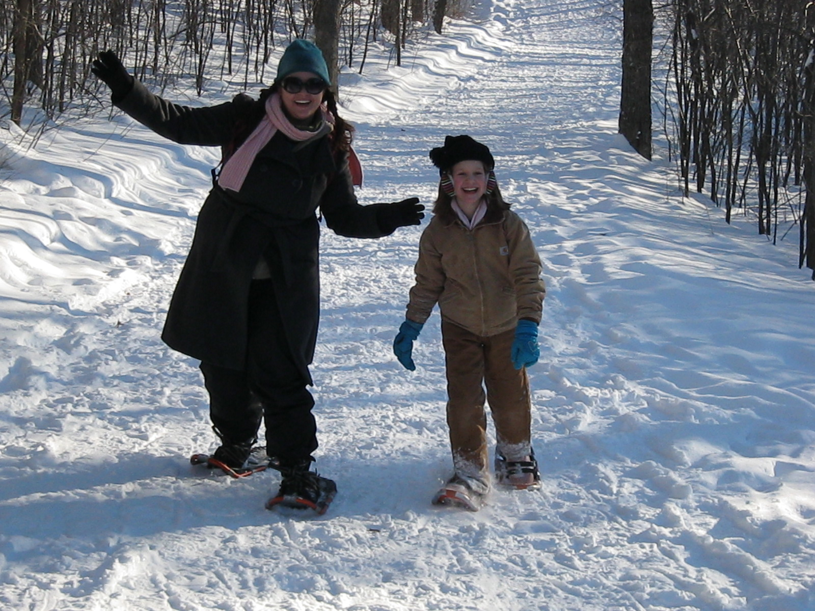 woman and child snowshoeing