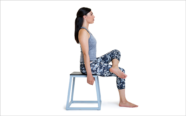Seated figure four yoga