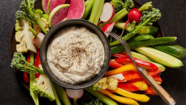 A bowl of caramelized onion dip