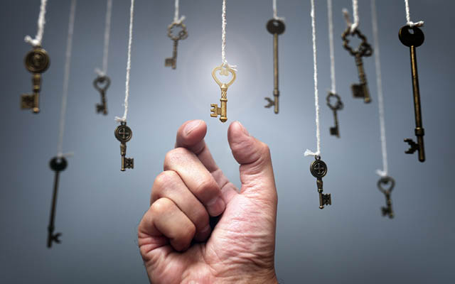 A person reaching for keys