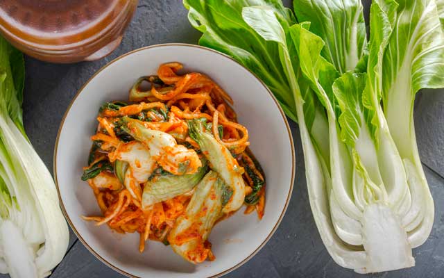 A picture of kimchi and Napa cabbage