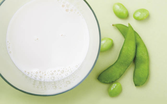 Soy beans and glass of soy milk