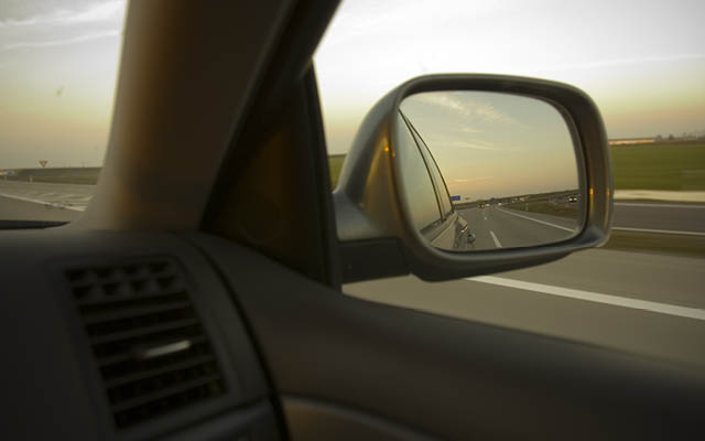 A rearview mirror on a car is displayed.