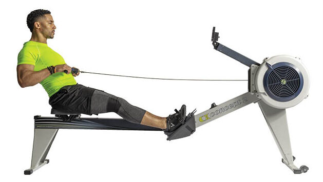 Man using row machine