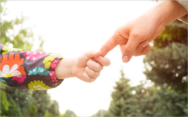 child-parent-hands