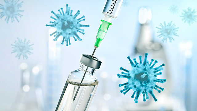 A needle plunging into a vial