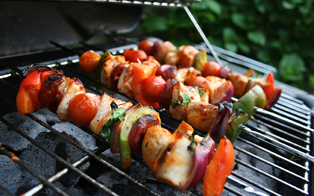A selection of BBQ skewers on the grill