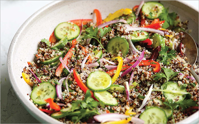 a bowl of Mediterranean quinoa salad by the Detoxinista