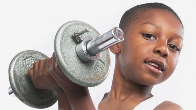 boy with dumbbell