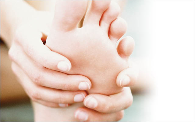 Massaging foot for plantar fasciitis relief